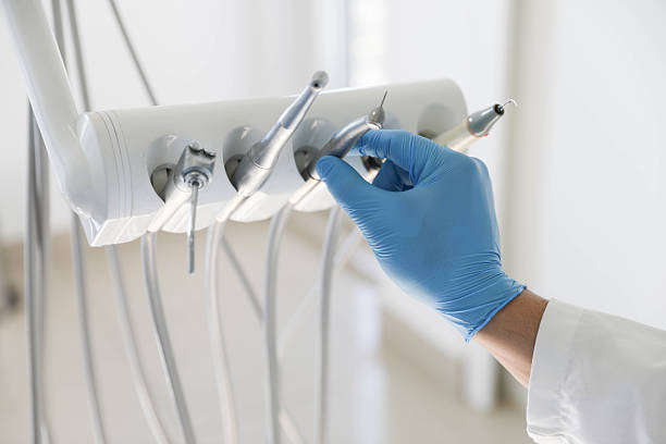 Professional Emergency Dentist technician working in Quanah, TX